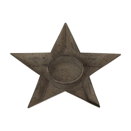 Hill Interiors rustic metal star tealight holder in a weathered brown finish with recessed centre, shown on a plain white background.