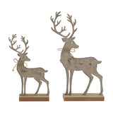 Hill Interiors rustic metal reindeer figures in brown with aged finish and twine bows, mounted on wooden stands, shown in two sizes on a white background.