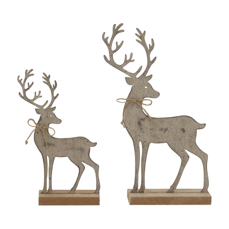 Hill Interiors rustic metal reindeer figures in brown with aged finish and twine bows, mounted on wooden stands, shown in two sizes on a white background.