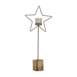 Hill Interiors Rustic Star Wooden Stand with Glass Votive in brown, featuring a tall metal star topper holding a clear glass votive on a chunky wood base.