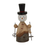 Hill Interiors rustic snowman figure with black top hat, hessian scarf and metal ski poles on a wood-effect body, shown against a plain white background.