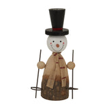 Hill Interiors rustic snowman figure with black top hat, burlap scarf and ski poles on a natural wood base, shown against a plain white background.