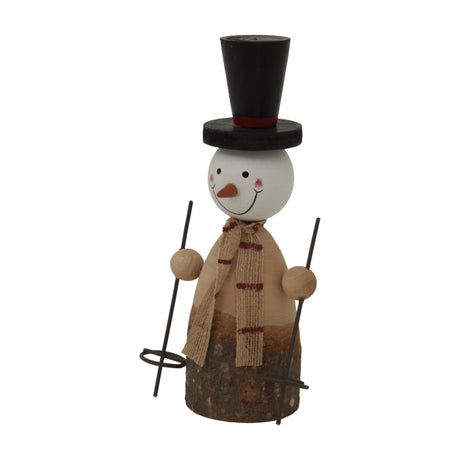 Hill Interiors rustic snowman figure with black top hat, burlap scarf, wooden body on a bark base, holding metal ski poles, on a white background.