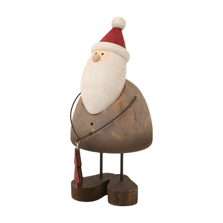 Hill Interiors rustic Santa figure in brown with red hat, white beard and small tree, standing on a plain white background.