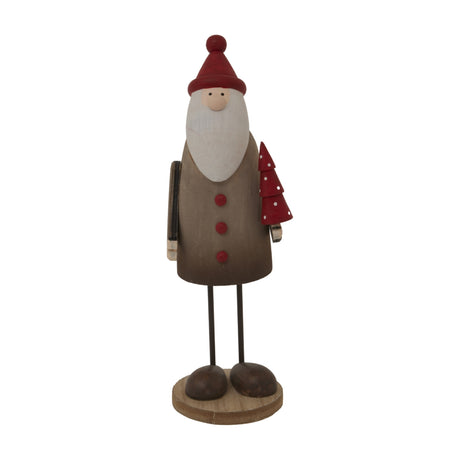 Hill Interiors Large Tall Rustic Santa Figure in brown with red hat, white beard, and small red tree, standing on a round base against a white background.