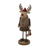 Hill Interiors rustic reindeer Christmas decoration in brown with red hat, buttons and hanging stocking, standing on a round base against a white background.