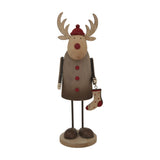 Hill Interiors rustic reindeer Christmas decoration in brown with antlers, red hat, buttons and nose, holding a small spotted stocking on a round base.