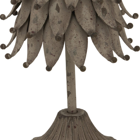 Close-up of Hill Interiors Rustic Decorative Metal Tree in silver, showing layered leaf-shaped tiers with ball tips above a fluted base.