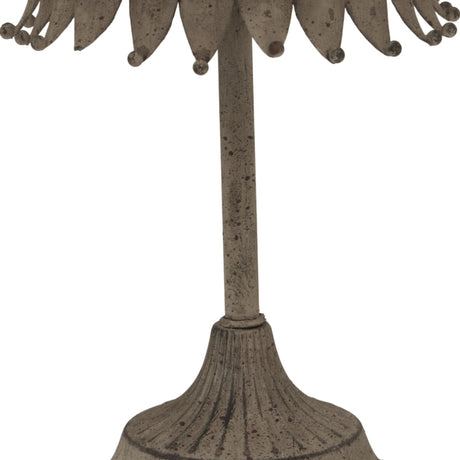 Close-up of Hill Interiors Large Rustic Decorative Tree with Star, showing the distressed silver metal stem and fluted base against a white background.