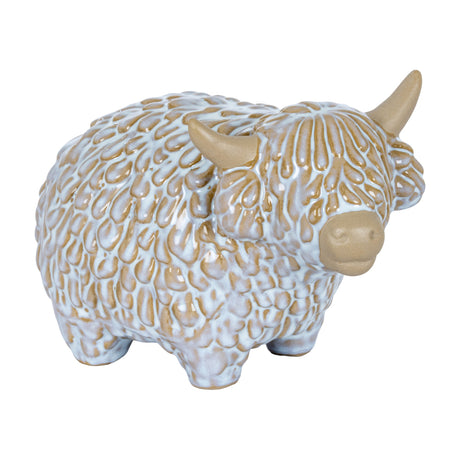 Hill Interiors medium ceramic Highland cow ornament with textured shaggy coat, long horns and soft white glaze, shown on a plain background.