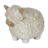 Hill Interiors ceramic Highland cow ornament in white glaze with textured shaggy coat and pale horns, shown on a plain white background.