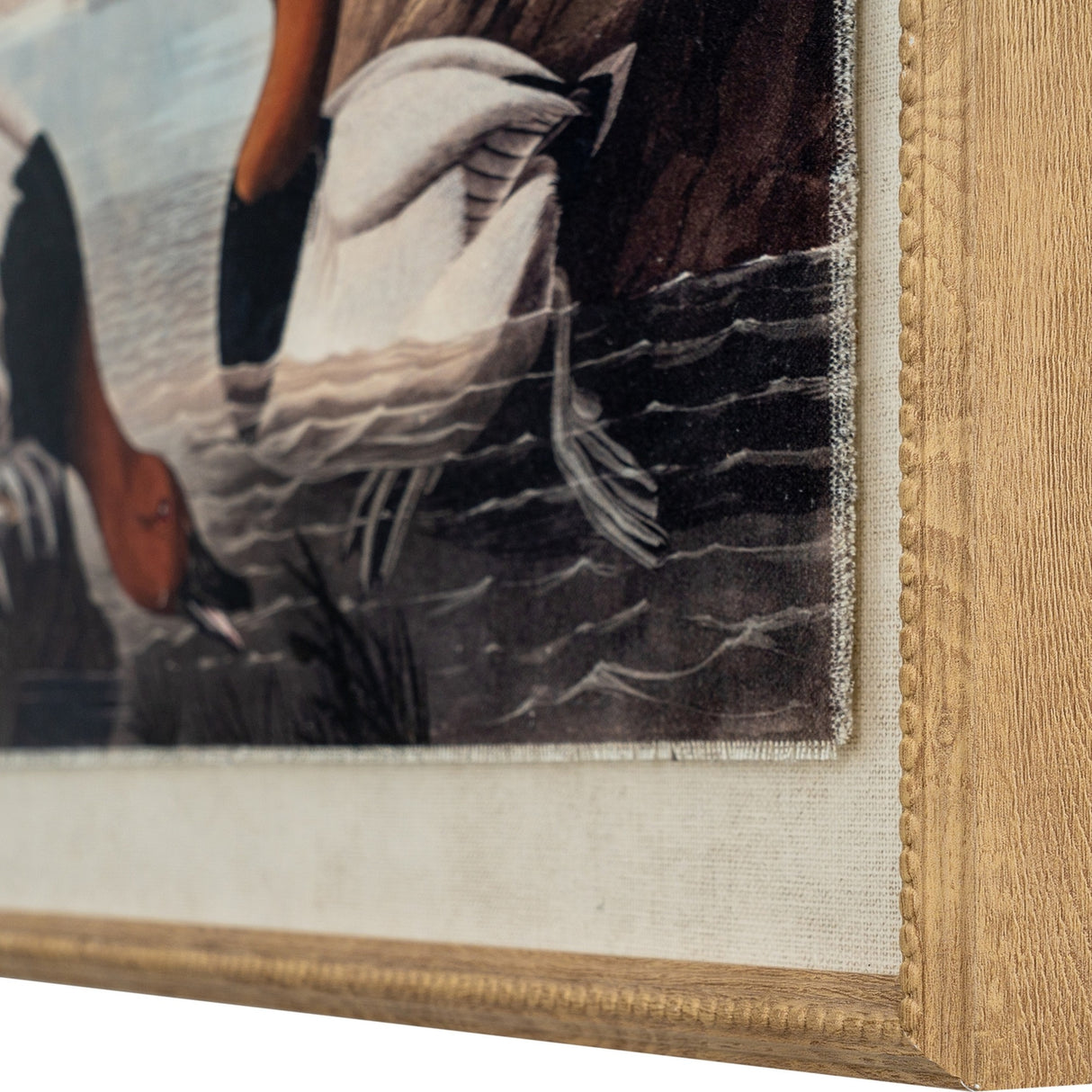 Corner close-up of Hill Interiors Pochards on Linen wall art showing the beaded brown wooden frame and linen-textured duck print behind glass.