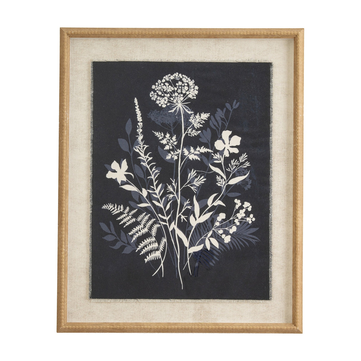 Hill Interiors Meadow on Linen portrait print with white fern and wildflower silhouettes on dark navy linen, set in a beaded wood frame.