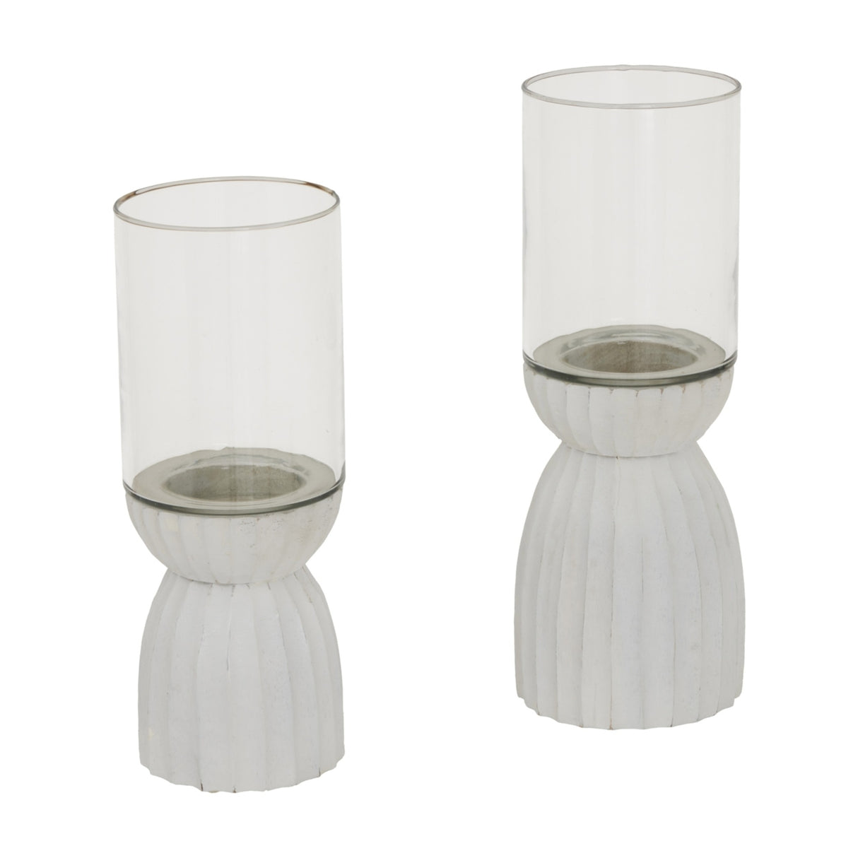 Hill Interiors Large White Hurricane Lanterns in two sizes, each with a clear glass shade on a ribbed white wooden base, on a plain background.