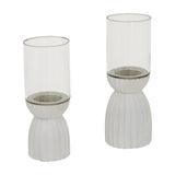Hill Interiors Large White Hurricane Lanterns in two sizes, each with a clear glass shade on a ribbed white wooden base, on a plain background.