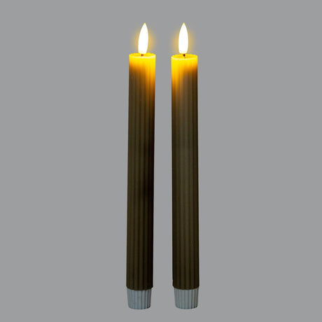 Hill Interiors Ribbed Taper Candles in sage green, a pair of slim fluted LED wax tapers with flickering flame tips, shown against a grey background.