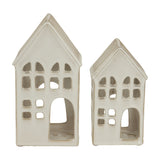 Hill Interiors Large White Ceramic House Tea Light Holders in two sizes, with pitched roofs, arched doorways and cut-out windows, on a white background.