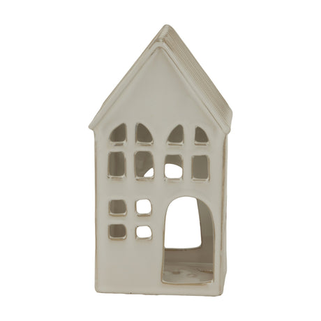 Hill Interiors white ceramic house tea light holder with pitched roof and cut-out windows, shown against a plain white background.