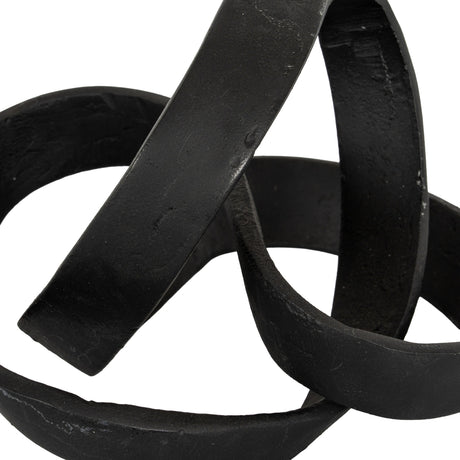 Close-up of the Hill Interiors Black Cast Knot Ornament, showing the looped aluminium form in a matte black finish against a plain white background.