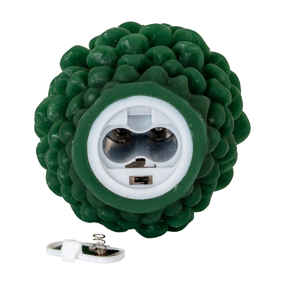 Hill Interiors Natural Glow LED wax candle in green, shown from the base with battery compartment open and removable cover beside it.