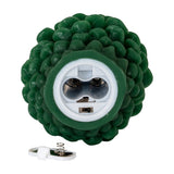 Hill Interiors Natural Glow LED wax candle in green, shown from the base with battery compartment open and removable cover beside it.
