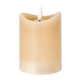 Hill Interiors Natural Glow Melted LED pillar candle in beige plastic with a melted-wax finish and flickering white LED flame, on a plain white background.