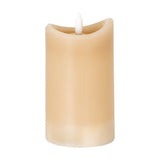 Hill Interiors Natural Glow beige LED pillar candle with a melted-edge top and flickering flame-shaped bulb, shown against a plain white background.
