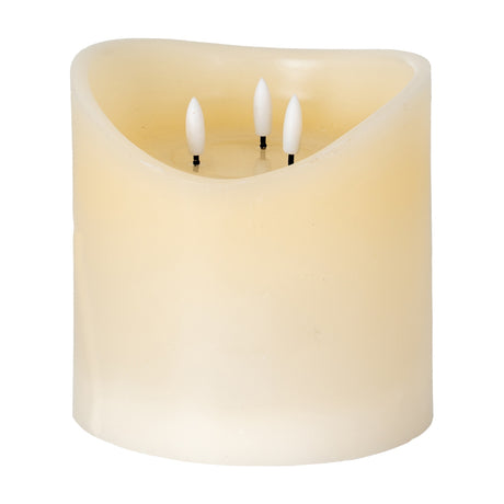 Hill Interiors Natural Glow beige LED pillar candle with wax-effect finish, melted top and three flameless wicks, shown on a plain white background.