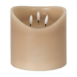 Hill Interiors Natural Glow beige LED pillar candle with a melted top and three flickering LED wicks, shown on a plain white background.