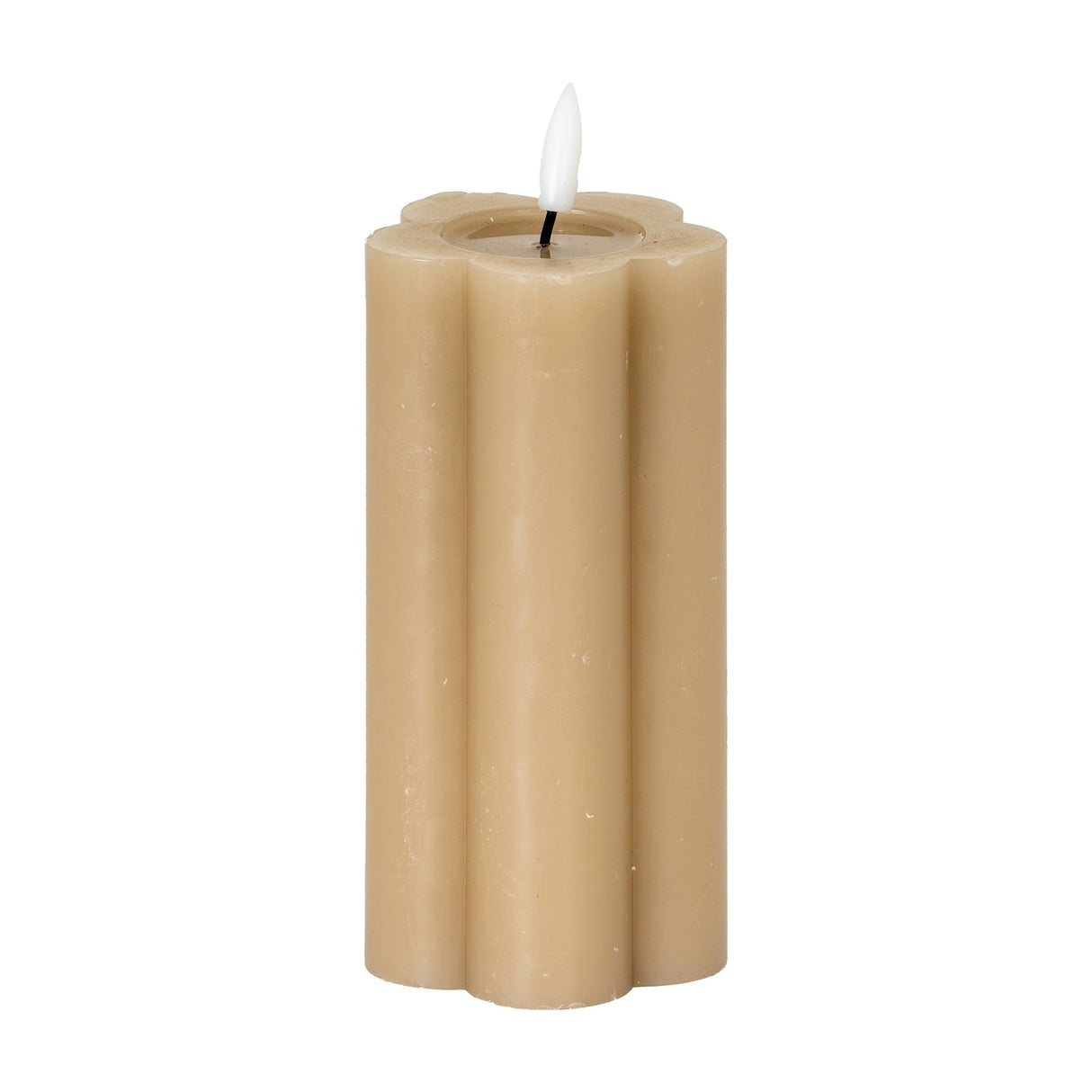 Hill Interiors Natural Glow beige LED pillar candle with a scalloped stone effect body and flickering flame-shaped tip, shown on a plain white background.