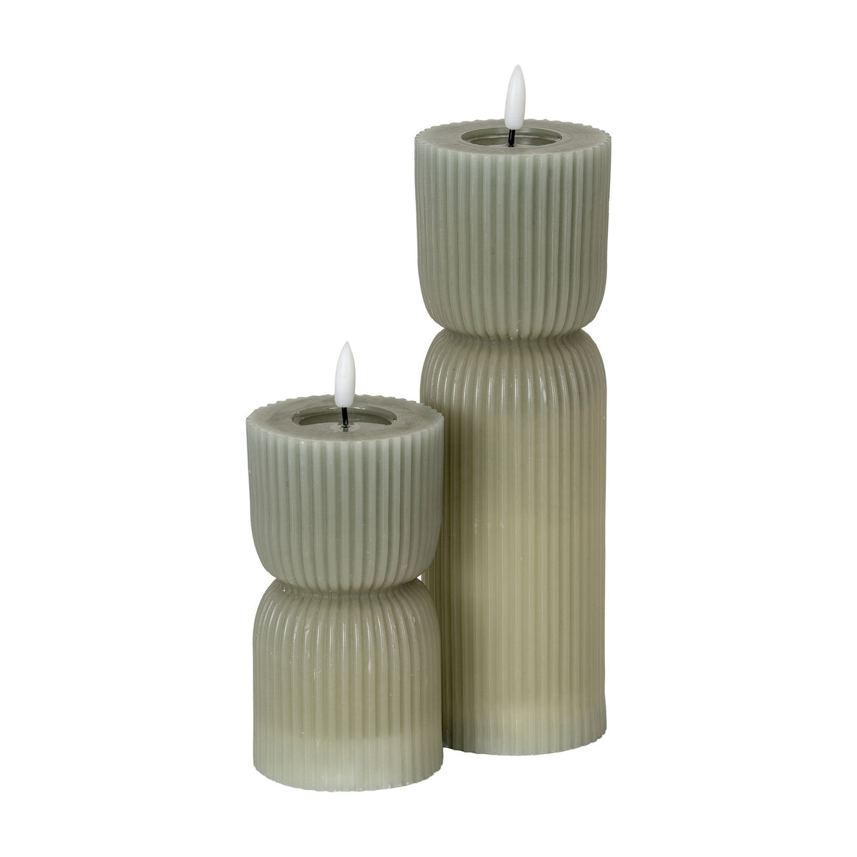 Hill Interiors Natural Glow beige LED pillar candles with ribbed carved surfaces and flickering flame tips, shown in two heights on a white background.
