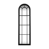 Hill Interiors tall arched window wall mirror with matt black wood frame and slim glazing bars dividing the panes, shown against a plain white background.