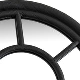 Close-up of the Hill Interiors Tall Arched Window Mirror showing the matt black wood frame's curved top and slim glazing bars dividing the glass panes.