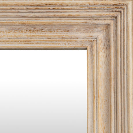 Close-up of the Hill Interiors Washed Wood Framed Rectangular Wall Mirror corner, showing the layered brown timber frame with visible grain and limed finish.