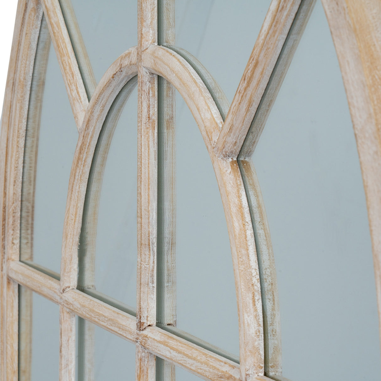 Close-up of Hill Interiors Washed Wood Arched Window Mirror in brown, showing the curved wooden pane detailing and soft washed grain finish.