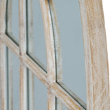 Close-up of Hill Interiors Washed Wood Arched Window Mirror in brown, showing the curved wooden frame edge and pane divisions with visible natural grain.