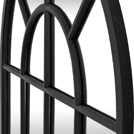 Close-up of the Hill Interiors Black Wood Arched Window Mirror showing the black wooden frame with slim panes and gently curved arched top.