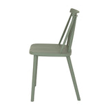 Side view of the Hill Interiors Brolvanic Accent Chair in French grey moulded plastic, showing the spindle back, curved seat and slim tapered legs.