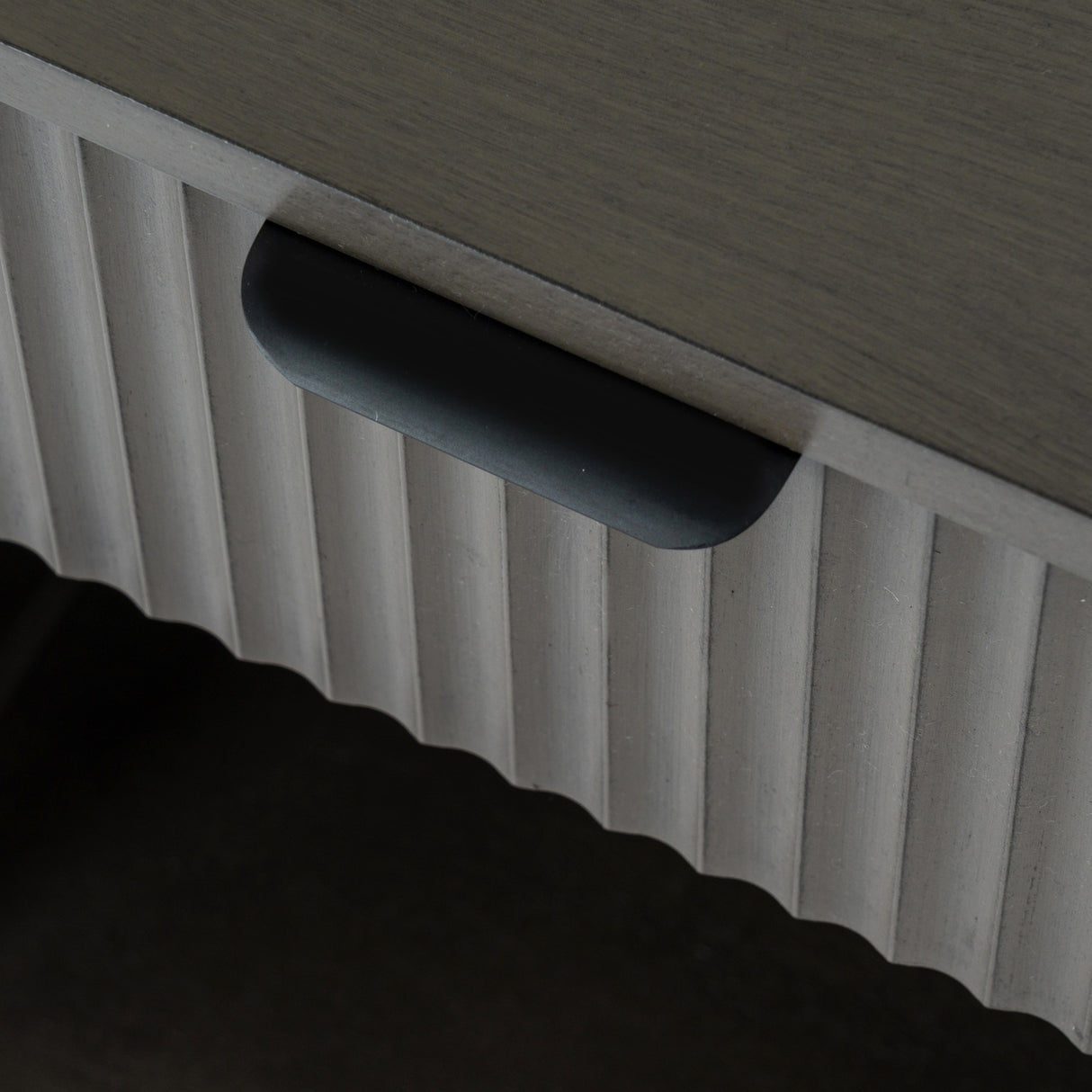 Close-up of the Hill Interiors 1 Drawer Wooden Cabinet showing the fluted drawer front, recessed dark handle, and warm brown wood top.