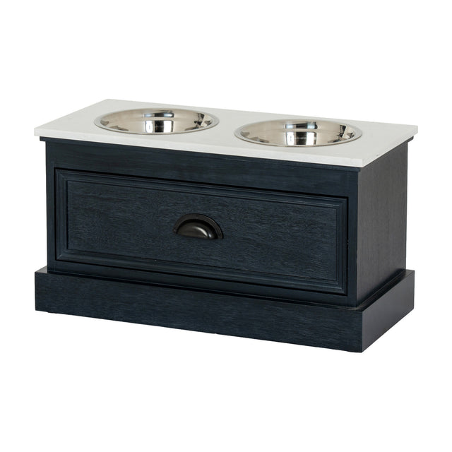 Hill Interiors Wooden Pet Feeder Table in black with a pale top, two stainless steel bowls, and a lower drawer with cup handle on a white background.