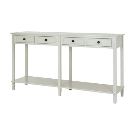 Hill Interiors 4 Drawer Wooden Console Table in white, with four front drawers, black round knobs, lower shelf and tapered legs, on a plain background.