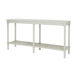 Hill Interiors Large Rattan Console Table in white with a solid wood frame, turned legs and a woven rattan lower shelf, on a plain background.
