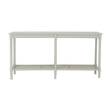 Hill Interiors Large Rattan Console Table in white, with a long wooden top, turned legs and a woven rattan lower shelf, on a plain background.