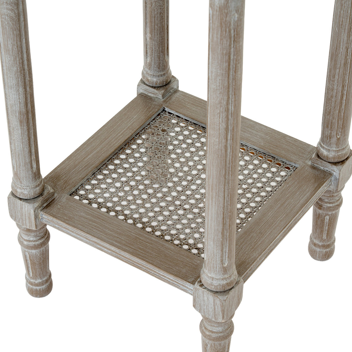 Hill Interiors Small Rattan Side Table in grey, close-up of the lower woven cane shelf set within a turned solid wood frame with soft grey wash finish.