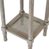 Hill Interiors Small Rattan Side Table in grey, close-up of the lower woven cane shelf set within a turned solid wood frame with soft grey wash finish.