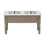 Hill Interiors Wooden Pet Feeder Table in grey with a pale top, turned legs and two stainless steel bowls set side by side, on a white background.