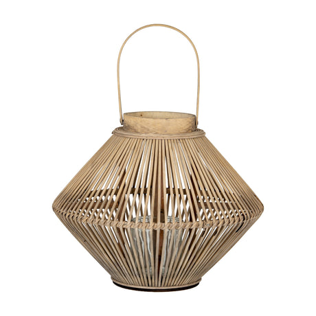 Hill Interiors Cone Wicker Lantern in brown, with tapered woven rattan form, arched handle and internal glass candle holder, on a plain background.