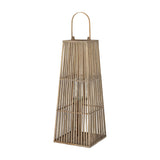 Hill Interiors large wicker lantern in warm brown with tapered slatted frame, arched handle and inner glass candle holder, on a plain white background.