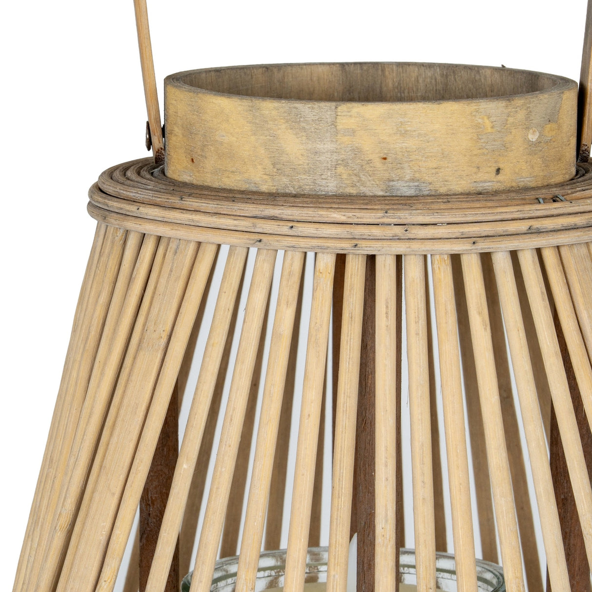 Close-up of Hill Interiors Large Wicker Lantern in brown, showing the tapered woven bamboo frame, wooden rim and clear glass candle holder inside.