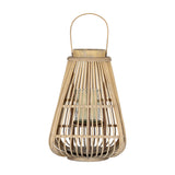 Hill Interiors Large Wicker Lantern in brown with tapered woven frame, arched handle and clear glass candle holder inside, on a white background.